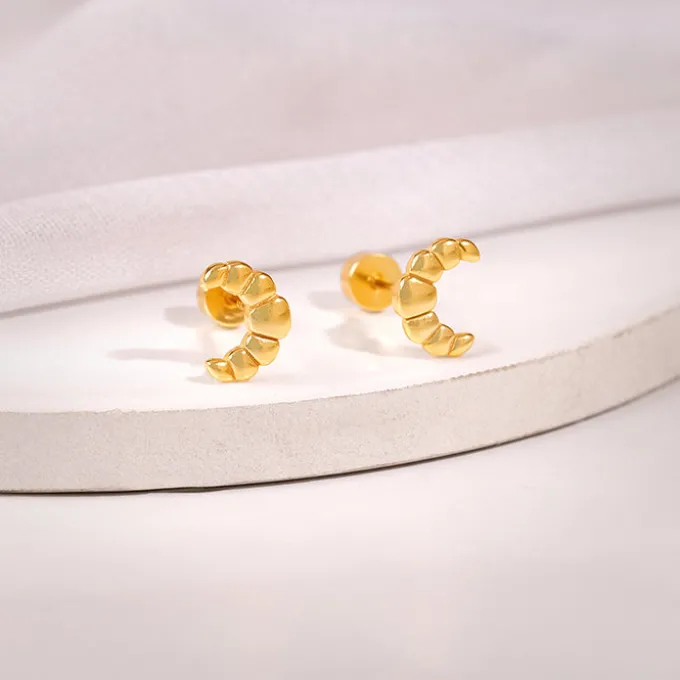 Golden Croissant Ear Piercings