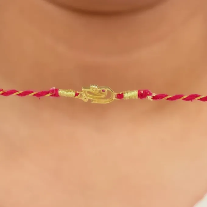 Golden Elegant Ganesha Rakhi
