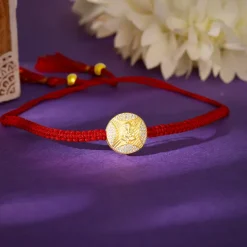 Golden Ganesha Blessing Rakhi