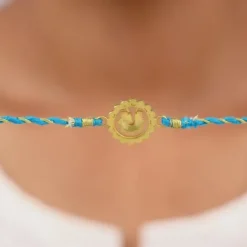 Golden Peacock Blossom Rakhi