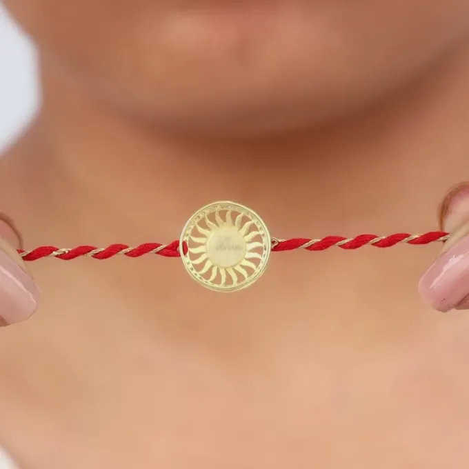 Golden Swastik Chakra Rakhi