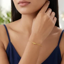 Kriti Sanon Golden Glowing Beads Bracelet