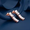 Rose Gold Glow Dangler Earrings