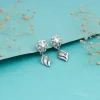 Silver Floral Twist Earrings