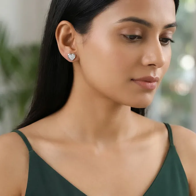 Silver Heart Glow Stud Earrings